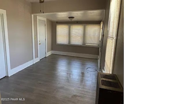 interior space featuring dark wood-type flooring