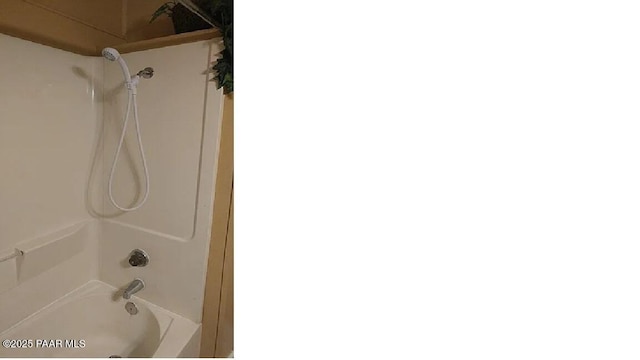 bathroom with shower / bathtub combination