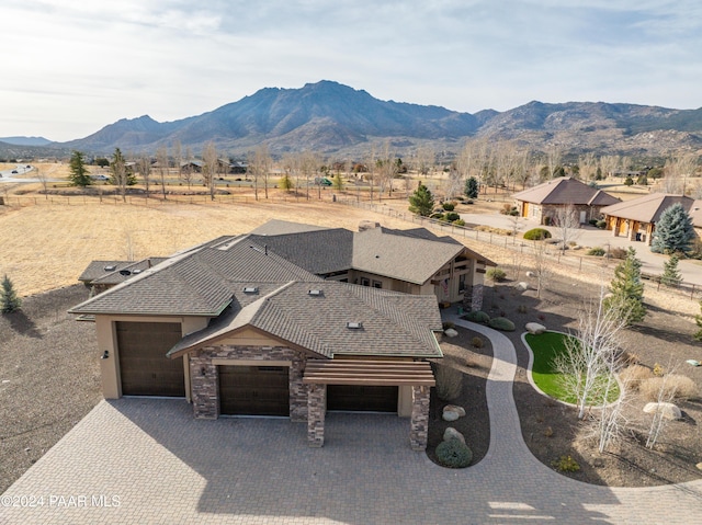 drone / aerial view featuring a mountain view