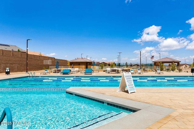 view of swimming pool with a gazebo