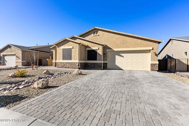 ranch-style house featuring a garage