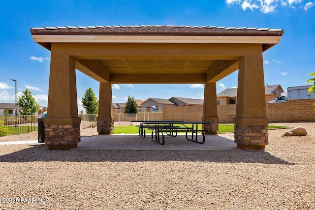 view of home's community with a patio area