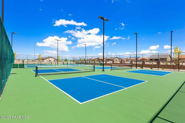 view of tennis court with basketball court