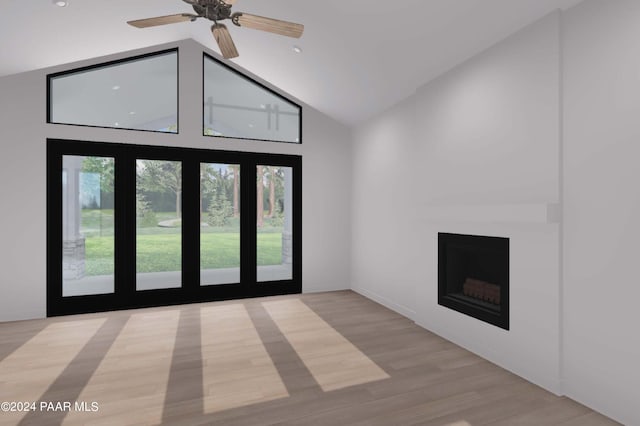 unfurnished living room featuring ceiling fan, high vaulted ceiling, and light wood-type flooring