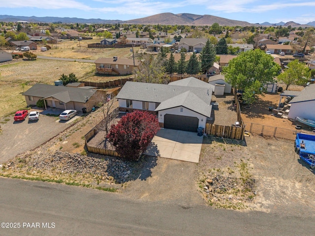 bird's eye view with a residential view and a mountain view