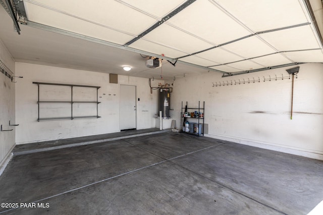 3713 W Nancy Ln, Phoenix, AZ 85041 - garage with water heater and a garage door opener