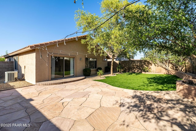 3713 W Nancy Ln, Phoenix, AZ 85041 - back of property featuring stucco siding, a fenced backyard, and a patio area