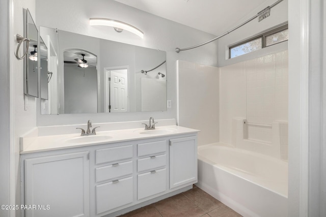 3713 W Nancy Ln, Phoenix, AZ 85041 - bathroom featuring bathing tub / shower combination, double vanity, a ceiling fan, and tile patterned flooring