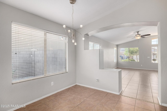 3713 W Nancy Ln, Phoenix, AZ 85041 - unfurnished room with lofted ceiling, light tile patterned floors, a ceiling fan, arched walkways, and a chandelier
