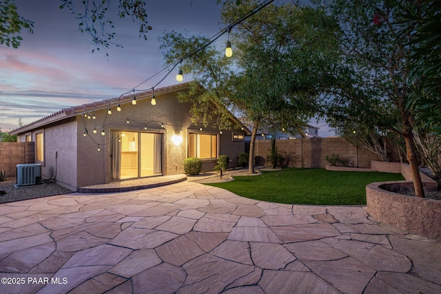 3713 W Nancy Ln, Phoenix, AZ 85041 - rear view of property featuring a patio, a fenced backyard, and stucco siding