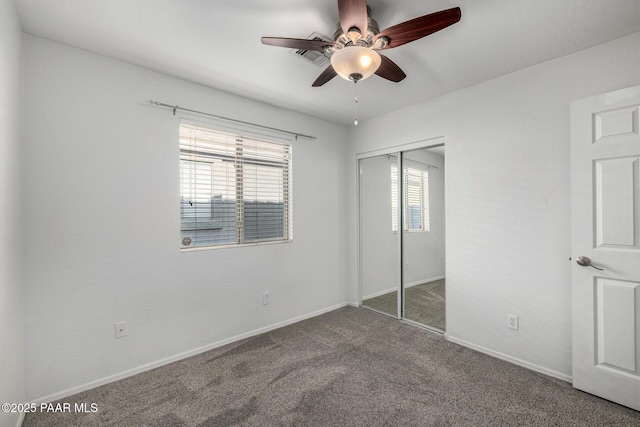 3713 W Nancy Ln, Phoenix, AZ 85041 - unfurnished bedroom with carpet floors, a closet, and a ceiling fan