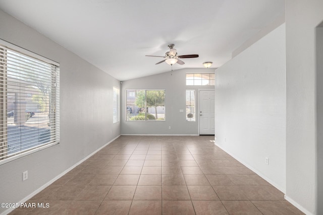 3713 W Nancy Ln, Phoenix, AZ 85041 - spare room with ceiling fan, vaulted ceiling, and tile patterned floors