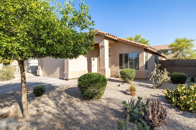 3713 W Nancy Ln, Phoenix, AZ 85041 - view of front of house with stucco siding, concrete driveway, and a tiled roof