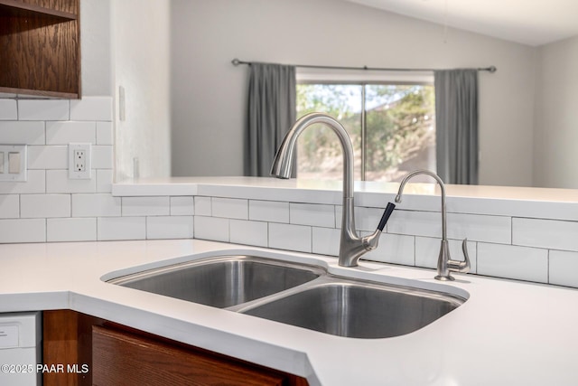 3713 W Nancy Ln, Phoenix, AZ 85041 - kitchen view of light countertops and tasteful backsplash