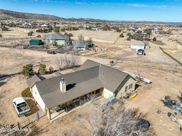 bird's eye view featuring view of desert and a mountain view