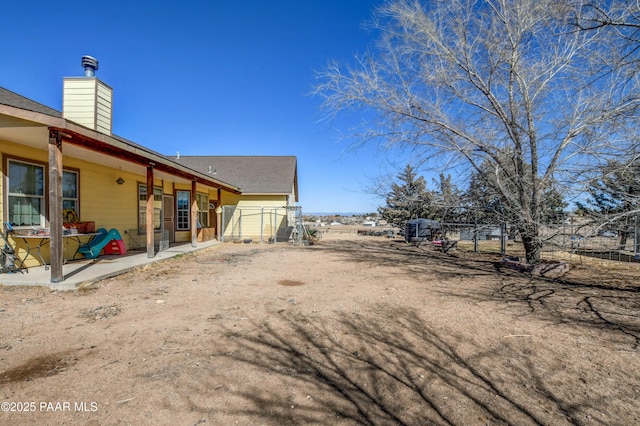 view of yard with a patio area and fence