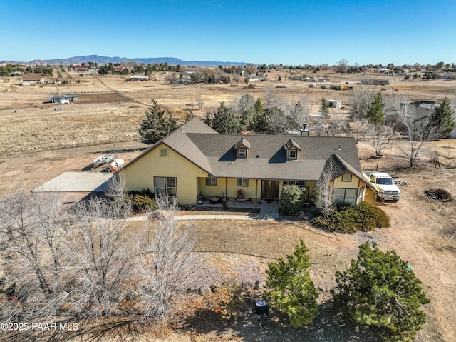 view of front of home with a mountain view