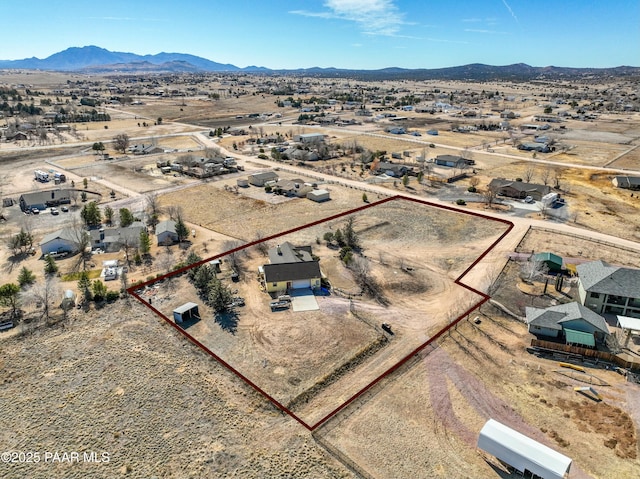 drone / aerial view with a mountain view and a desert view