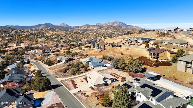 drone / aerial view featuring a mountain view