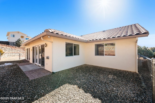 rear view of property with a patio