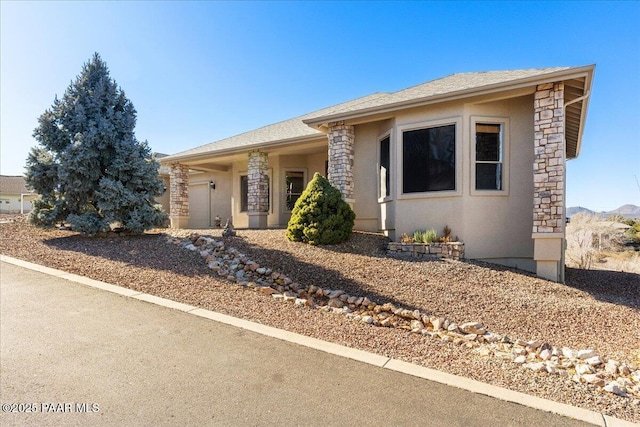 single story home with a garage