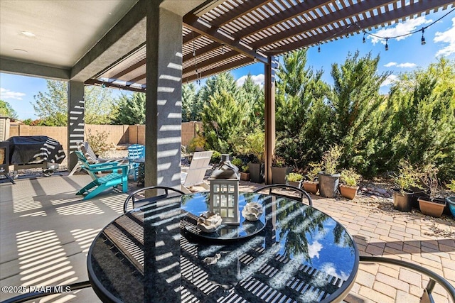 7123 E Roque Ln, Prescott Valley, AZ 86315 - view of patio featuring outdoor dining space, a pergola, and a fenced backyard