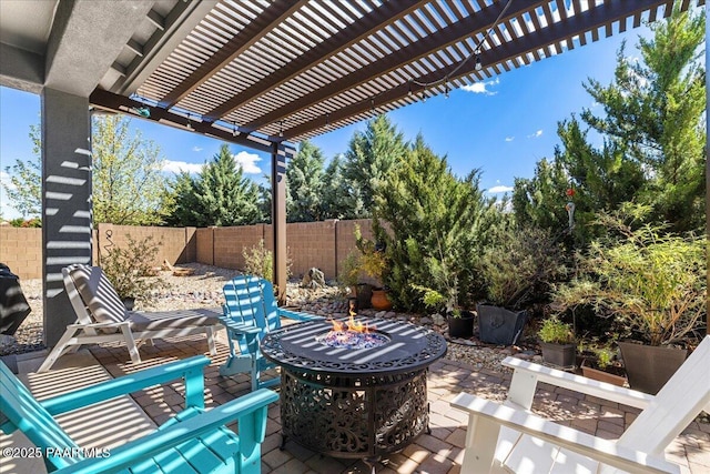 7123 E Roque Ln, Prescott Valley, AZ 86315 - view of patio featuring an outdoor fire pit, a fenced backyard, and a pergola