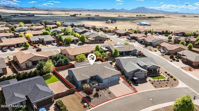 7123 E Roque Ln, Prescott Valley, AZ 86315 - aerial perspective of suburban area with property parcel outlined and a mountain backdrop