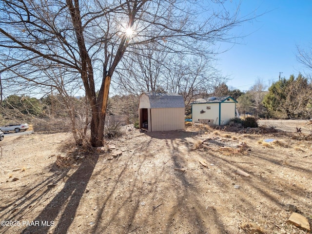 view of front of property with a storage unit