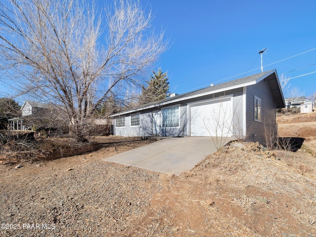 exterior space with a garage