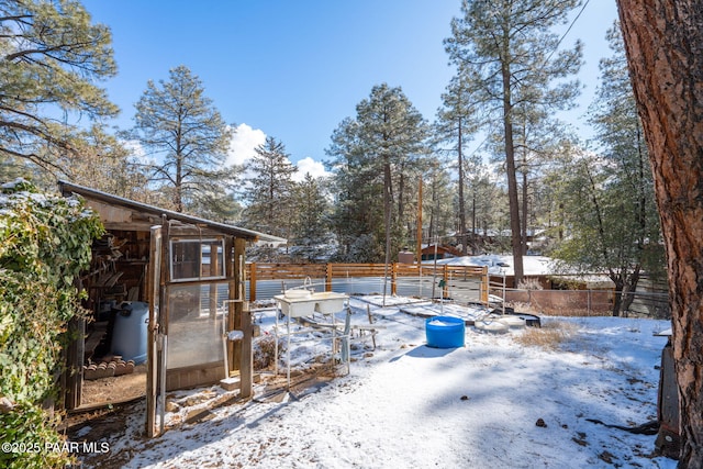 view of snowy yard