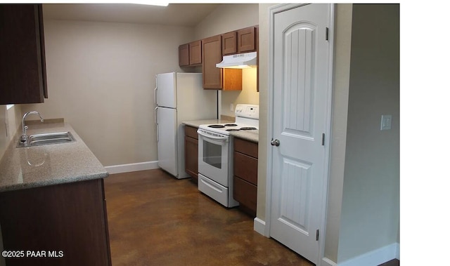 kitchen featuring sink and white appliances