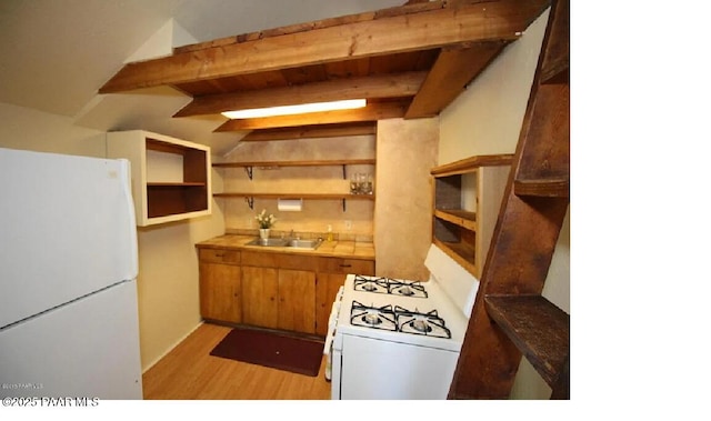 kitchen with white appliances, beam ceiling, light hardwood / wood-style floors, and sink