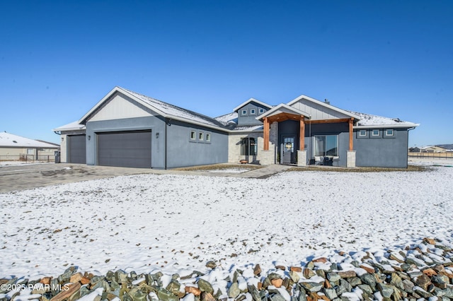 view of front of property featuring a garage