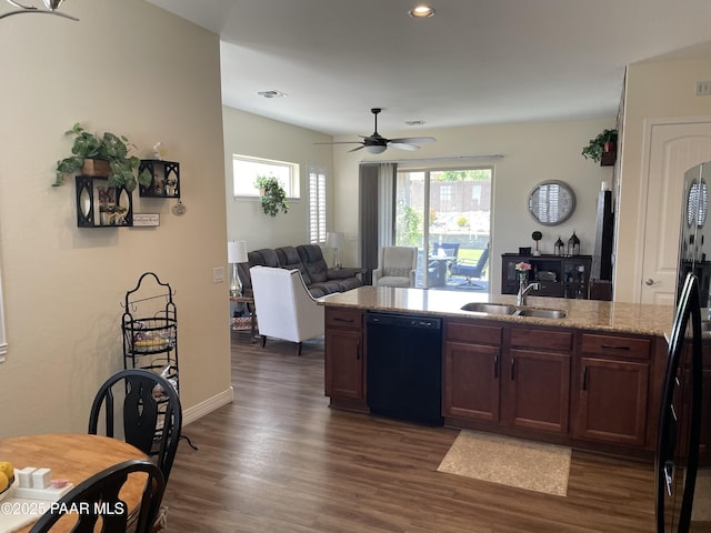 6175 Greer Ln, Prescott Valley, AZ 86314 - kitchen featuring a wealth of natural light, a sink, black appliances, and dark wood-type flooring