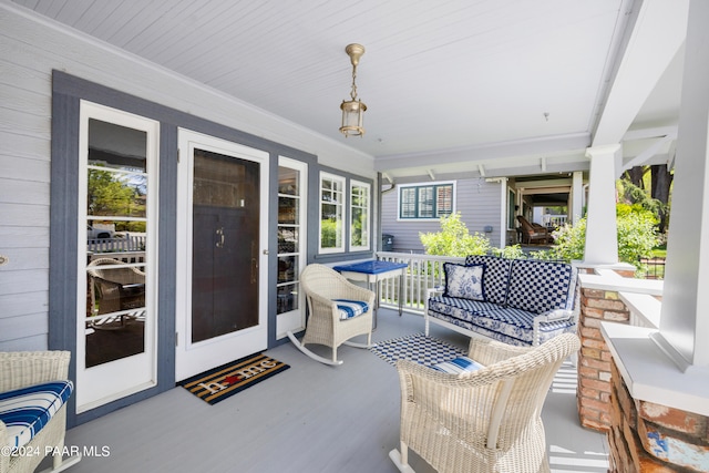 view of patio featuring a porch