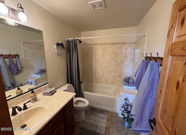 bathroom with shower / bath combination with curtain, visible vents, vanity, and toilet