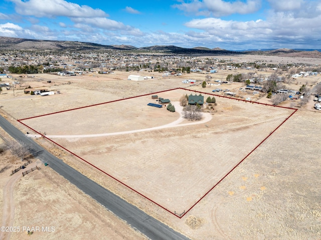 drone / aerial view featuring a mountain view