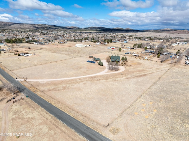 drone / aerial view featuring a mountain view