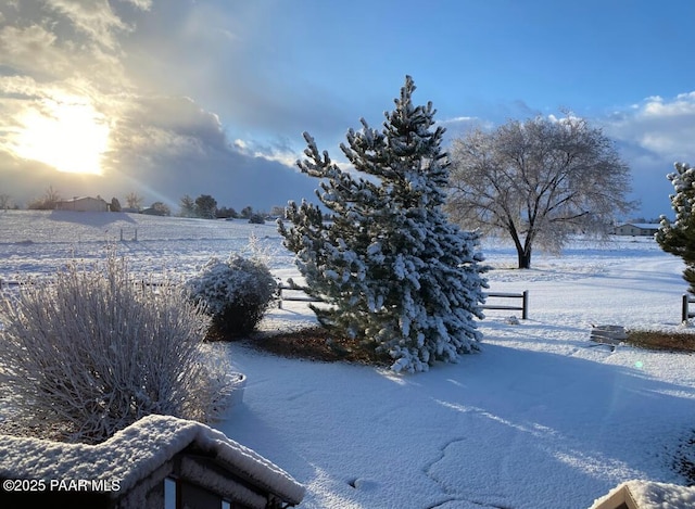 view of yard covered in snow