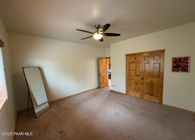 1740 W Bumblebee Rd, Chino Valley, AZ 86323 - unfurnished bedroom with carpet, baseboards, a ceiling fan, and a closet