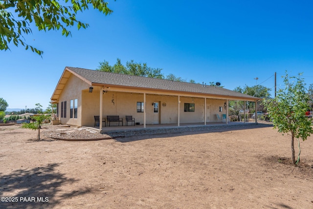 2049 N Maricopa St, Chino Valley, AZ 86323 - back of property with a patio area and stucco siding