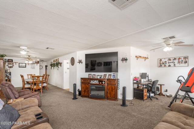 2049 N Maricopa St, Chino Valley, AZ 86323 - carpeted living area with ceiling fan and an office area
