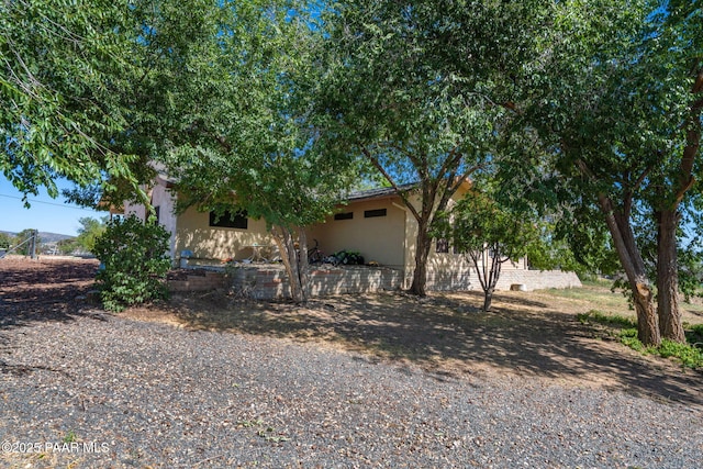 2049 N Maricopa St, Chino Valley, AZ 86323 - view of side of property with stucco siding
