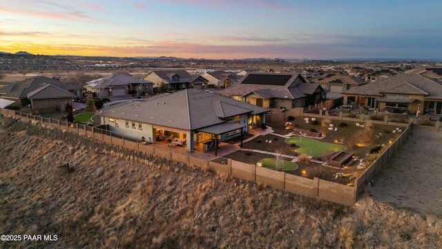 view of aerial view at dusk