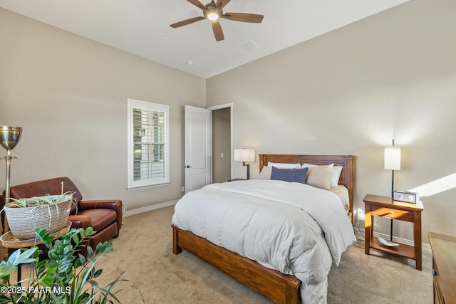 bedroom with light carpet and ceiling fan