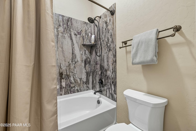 bathroom featuring toilet and shower / bathtub combination with curtain