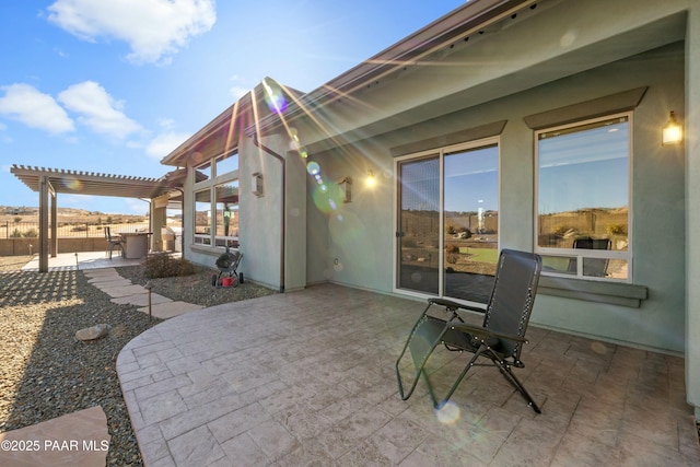 view of patio featuring a pergola