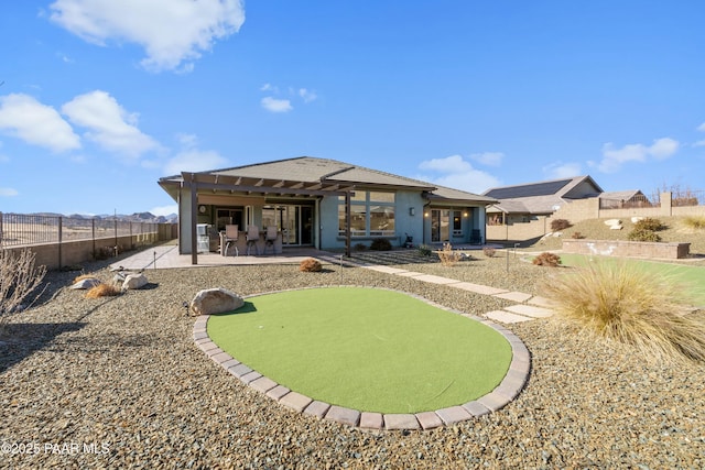 back of house with a patio area