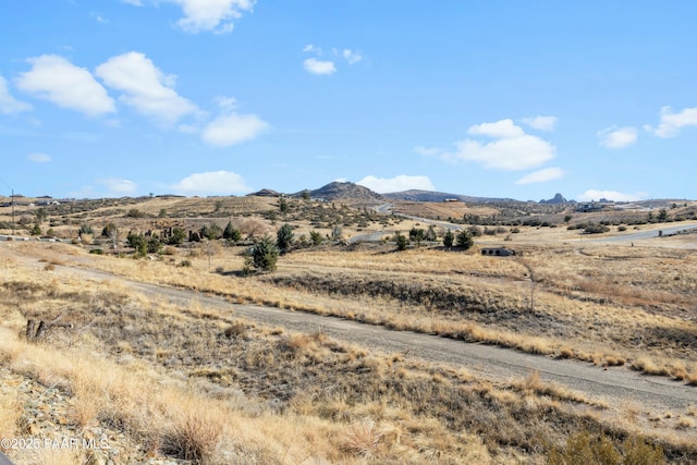 property view of mountains featuring a rural view